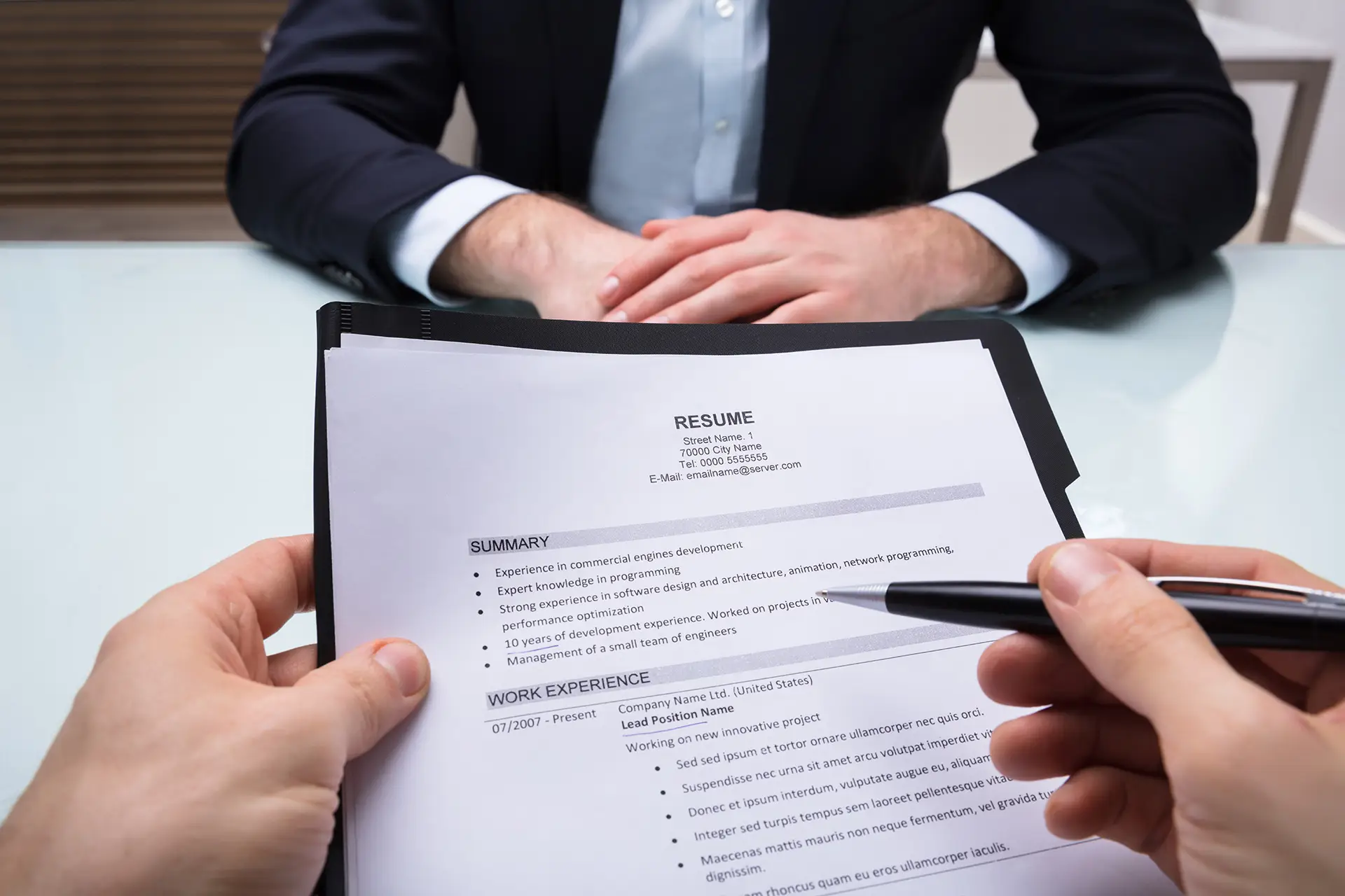 hand holding resume